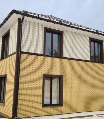 Отделка дома кирпичом или панелями под кирпич: сравнение